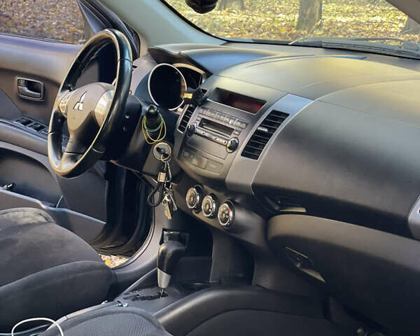 Міцубісі Аутлендер 2011 у Хмельницькому на Automoto.ua Чорний Міцубісі Аутлендер, об'ємом двигуна 2 л та пробігом 196 тис. км за 9500 $, фото 16 на Automoto.ua
