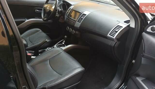 Черный Мицубиси Аутлендер, объемом двигателя 2.2 л и пробегом 209 тыс. км за 12700 $, фото 33 на Automoto.ua