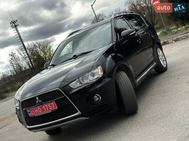 Міцубісі Аутлендер 2011 у Бердичеве на Automoto.ua Чорний Міцубісі Аутлендер, об'ємом двигуна 2.2 л та пробігом 237 тис. км за 11499 $, фото 14 на Automoto.ua