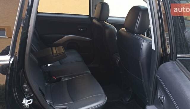 Черный Мицубиси Аутлендер, объемом двигателя 2.2 л и пробегом 209 тыс. км за 12700 $, фото 34 на Automoto.ua