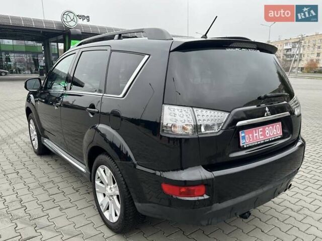 Черный Мицубиси Аутлендер, объемом двигателя 2.2 л и пробегом 226 тыс. км за 10750 $, фото 17 на Automoto.ua
