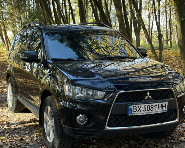 Міцубісі Аутлендер 2011 у Хмельницькому на Automoto.ua Чорний Міцубісі Аутлендер, об'ємом двигуна 2 л та пробігом 196 тис. км за 9500 $, фото 27 на Automoto.ua
