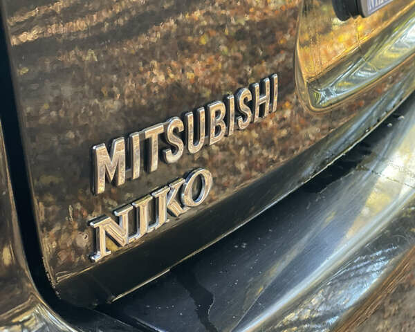 Міцубісі Аутлендер 2011 у Хмельницькому на Automoto.ua Чорний Міцубісі Аутлендер, об'ємом двигуна 2 л та пробігом 196 тис. км за 9500 $, фото 4 на Automoto.ua