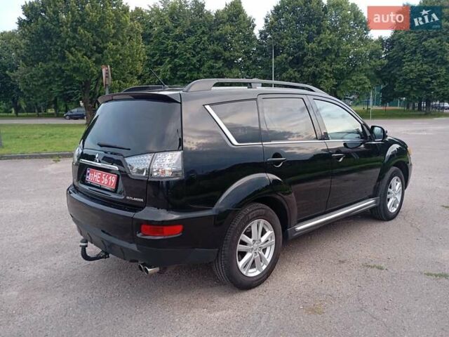 Чорний Міцубісі Аутлендер, об'ємом двигуна 2.2 л та пробігом 238 тис. км за 10100 $, фото 4 на Automoto.ua