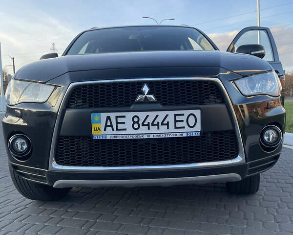 Чорний Міцубісі Аутлендер, об'ємом двигуна 2.4 л та пробігом 93 тис. км за 12500 $, фото 3 на Automoto.ua