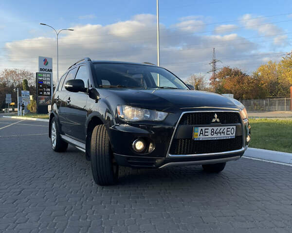 Чорний Міцубісі Аутлендер, об'ємом двигуна 2.4 л та пробігом 93 тис. км за 12500 $, фото 1 на Automoto.ua