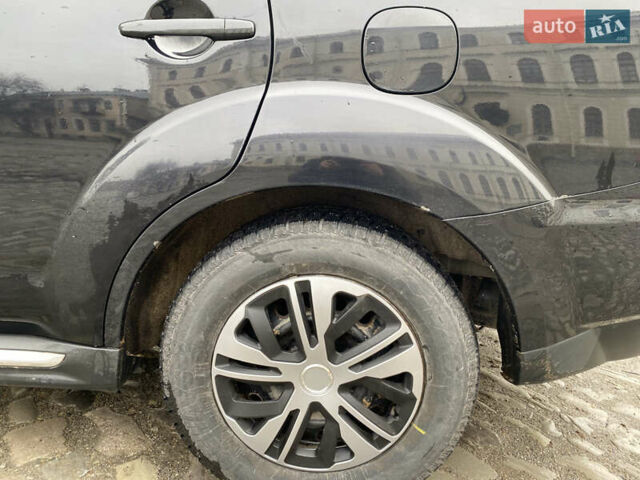 Черный Мицубиси Аутлендер, объемом двигателя 2.27 л и пробегом 233 тыс. км за 10500 $, фото 13 на Automoto.ua