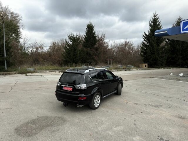 Черный Мицубиси Аутлендер, объемом двигателя 2.2 л и пробегом 237 тыс. км за 11450 $, фото 7 на Automoto.ua