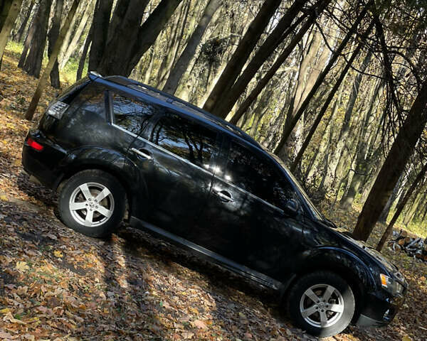 Міцубісі Аутлендер 2011 у Хмельницькому на Automoto.ua Чорний Міцубісі Аутлендер, об'ємом двигуна 2 л та пробігом 196 тис. км за 9500 $, фото 10 на Automoto.ua