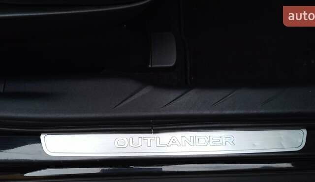 Черный Мицубиси Аутлендер, объемом двигателя 2.2 л и пробегом 209 тыс. км за 12700 $, фото 42 на Automoto.ua