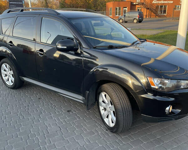 Чорний Міцубісі Аутлендер, об'ємом двигуна 2.4 л та пробігом 93 тис. км за 12500 $, фото 5 на Automoto.ua
