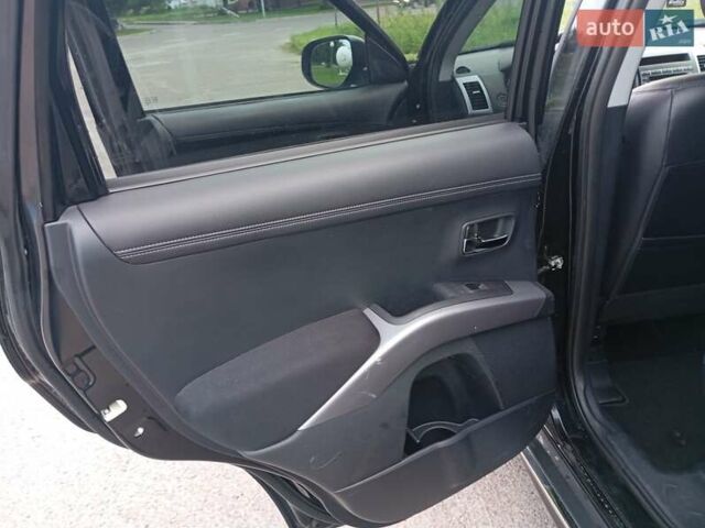 Чорний Міцубісі Аутлендер, об'ємом двигуна 2.2 л та пробігом 238 тис. км за 10100 $, фото 14 на Automoto.ua