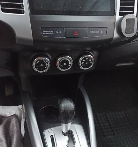 Черный Мицубиси Аутлендер, объемом двигателя 2 л и пробегом 196 тыс. км за 9900 $, фото 17 на Automoto.ua