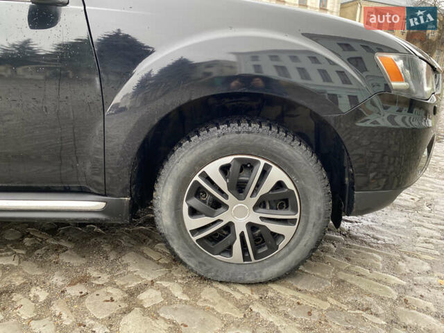 Черный Мицубиси Аутлендер, объемом двигателя 2.27 л и пробегом 233 тыс. км за 10500 $, фото 15 на Automoto.ua