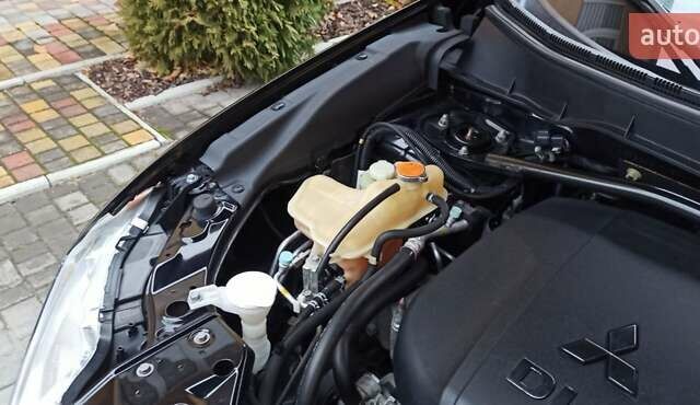 Черный Мицубиси Аутлендер, объемом двигателя 2.2 л и пробегом 209 тыс. км за 12700 $, фото 44 на Automoto.ua