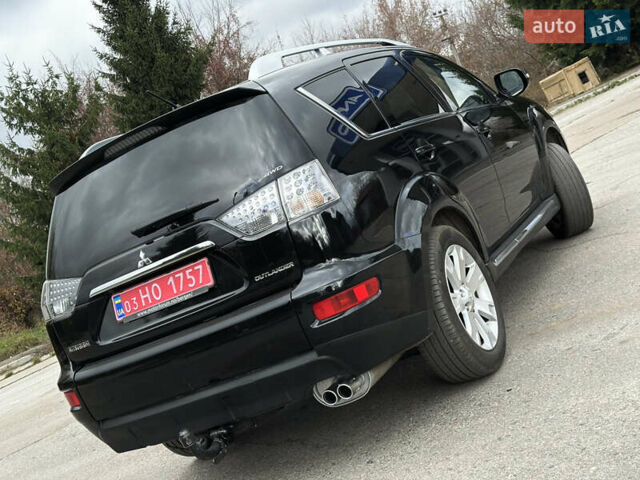 Міцубісі Аутлендер 2011 у Бердичеве на Automoto.ua Чорний Міцубісі Аутлендер, об'ємом двигуна 2.2 л та пробігом 237 тис. км за 11499 $, фото 12 на Automoto.ua