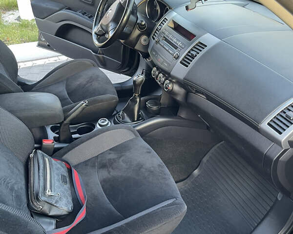 Чорний Міцубісі Аутлендер, об'ємом двигуна 2.4 л та пробігом 93 тис. км за 12500 $, фото 21 на Automoto.ua