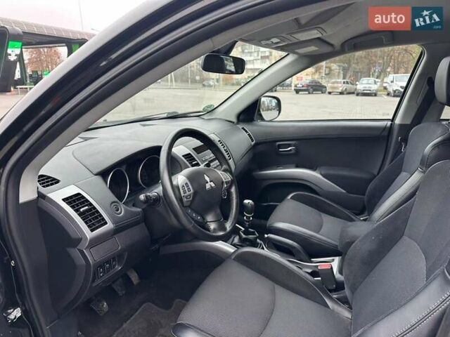 Черный Мицубиси Аутлендер, объемом двигателя 2.2 л и пробегом 226 тыс. км за 10750 $, фото 8 на Automoto.ua
