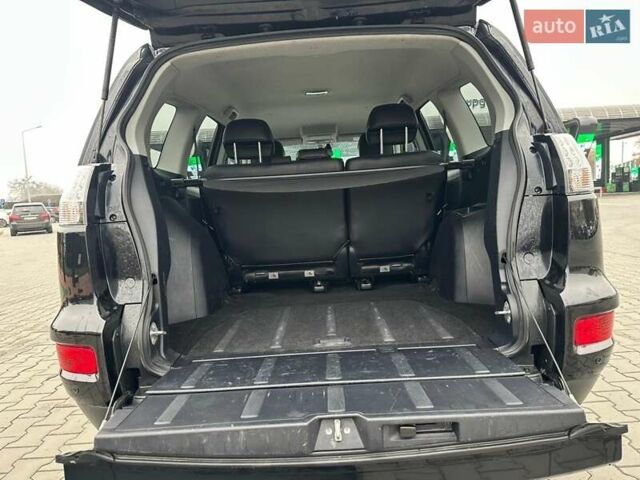 Черный Мицубиси Аутлендер, объемом двигателя 2.2 л и пробегом 226 тыс. км за 10750 $, фото 37 на Automoto.ua