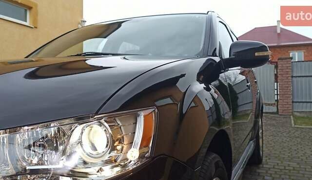 Черный Мицубиси Аутлендер, объемом двигателя 2.2 л и пробегом 209 тыс. км за 12700 $, фото 12 на Automoto.ua