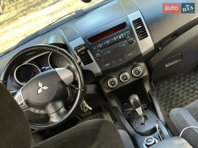 Міцубісі Аутлендер 2011 у Хмельницькому на Automoto.ua Чорний Міцубісі Аутлендер, об'ємом двигуна 2 л та пробігом 196 тис. км за 9500 $, фото 17 на Automoto.ua