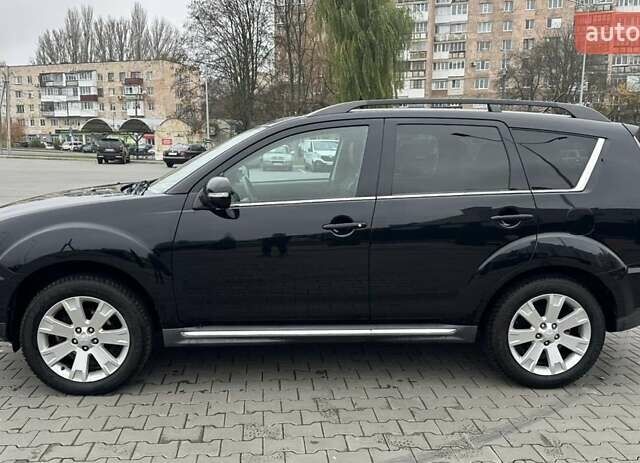 Черный Мицубиси Аутлендер, объемом двигателя 2.2 л и пробегом 226 тыс. км за 10750 $, фото 7 на Automoto.ua