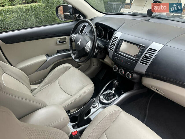 Чорний Міцубісі Аутлендер, об'ємом двигуна 2.2 л та пробігом 216 тис. км за 12000 $, фото 15 на Automoto.ua