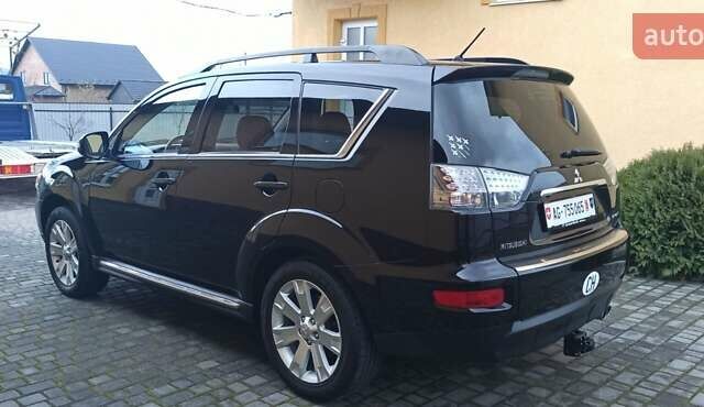 Черный Мицубиси Аутлендер, объемом двигателя 2.2 л и пробегом 209 тыс. км за 12700 $, фото 16 на Automoto.ua