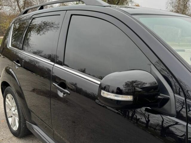 Черный Мицубиси Аутлендер, объемом двигателя 2.2 л и пробегом 253 тыс. км за 12500 $, фото 12 на Automoto.ua