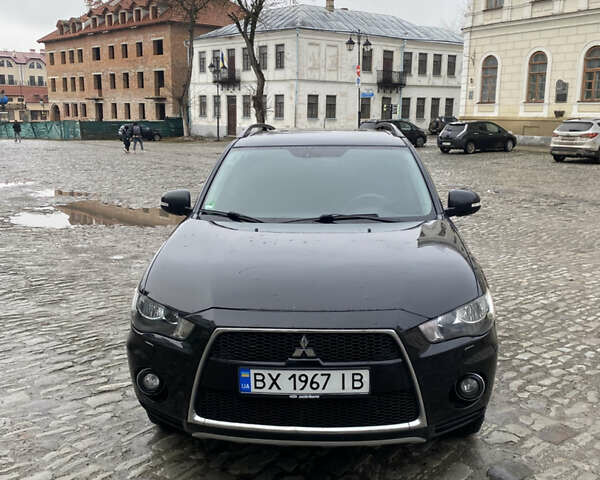 Черный Мицубиси Аутлендер, объемом двигателя 2.27 л и пробегом 233 тыс. км за 10500 $, фото 2 на Automoto.ua