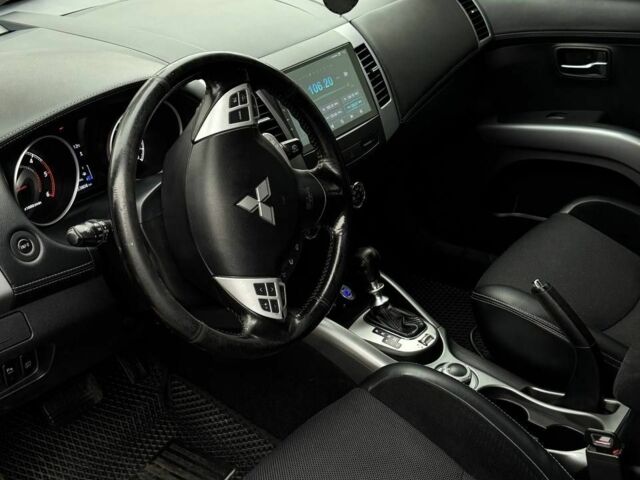 Черный Мицубиси Аутлендер, объемом двигателя 2.2 л и пробегом 253 тыс. км за 12500 $, фото 5 на Automoto.ua