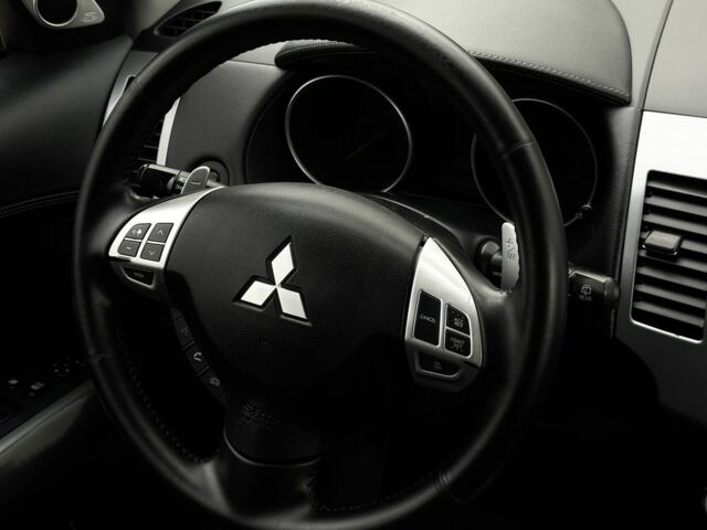 Черный Мицубиси Аутлендер, объемом двигателя 2.2 л и пробегом 237 тыс. км за 11450 $, фото 14 на Automoto.ua