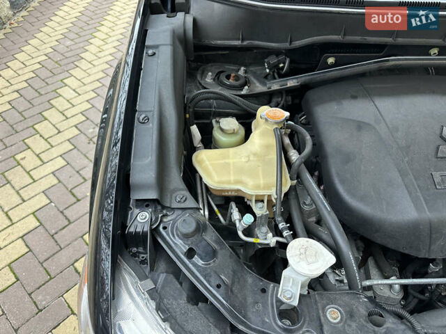 Чорний Міцубісі Аутлендер, об'ємом двигуна 2.2 л та пробігом 216 тис. км за 12000 $, фото 26 на Automoto.ua