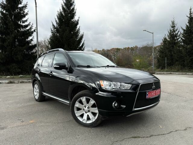 Черный Мицубиси Аутлендер, объемом двигателя 2.2 л и пробегом 237 тыс. км за 11450 $, фото 2 на Automoto.ua