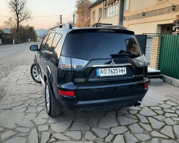 Чорний Міцубісі Аутлендер, об'ємом двигуна 2.3 л та пробігом 245 тис. км за 11500 $, фото 5 на Automoto.ua