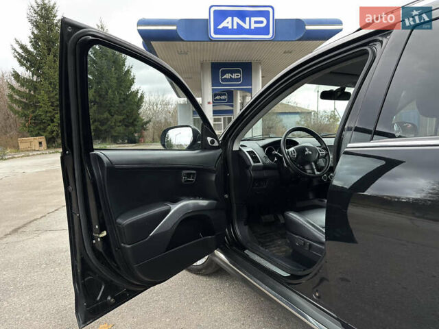 Міцубісі Аутлендер 2011 у Бердичеве на Automoto.ua Чорний Міцубісі Аутлендер, об'ємом двигуна 2.2 л та пробігом 237 тис. км за 11499 $, фото 28 на Automoto.ua