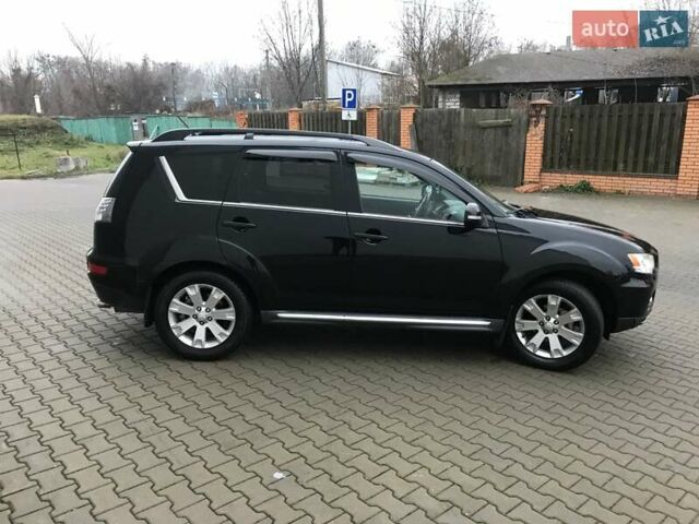 Чорний Міцубісі Аутлендер, об'ємом двигуна 2.18 л та пробігом 295 тис. км за 10900 $, фото 2 на Automoto.ua