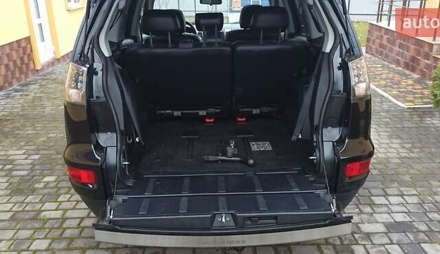 Черный Мицубиси Аутлендер, объемом двигателя 2.2 л и пробегом 209 тыс. км за 12700 $, фото 39 на Automoto.ua