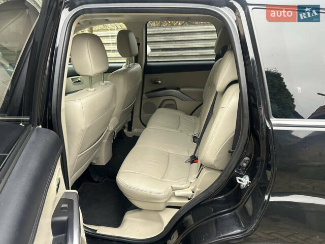 Чорний Міцубісі Аутлендер, об'ємом двигуна 2.2 л та пробігом 216 тис. км за 12000 $, фото 17 на Automoto.ua