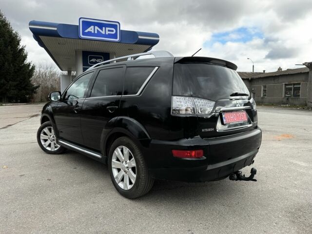 Черный Мицубиси Аутлендер, объемом двигателя 2.2 л и пробегом 237 тыс. км за 11450 $, фото 4 на Automoto.ua