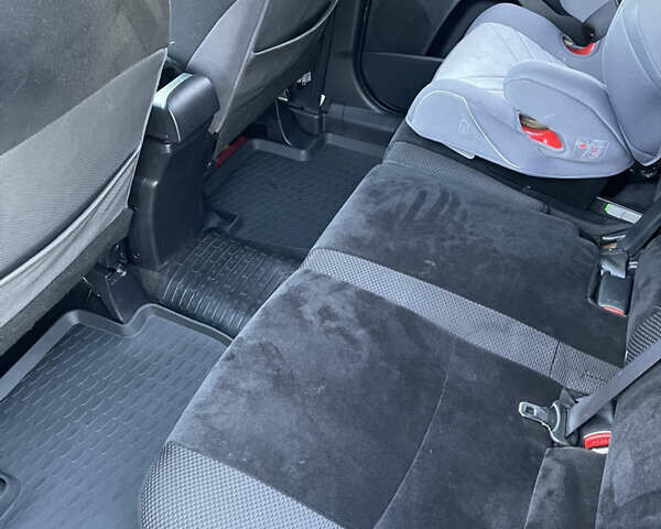 Чорний Міцубісі Аутлендер, об'ємом двигуна 2.4 л та пробігом 93 тис. км за 12500 $, фото 18 на Automoto.ua