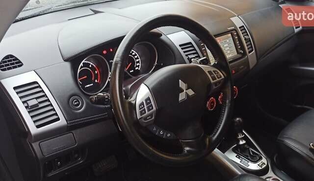 Черный Мицубиси Аутлендер, объемом двигателя 2.2 л и пробегом 209 тыс. км за 12700 $, фото 20 на Automoto.ua