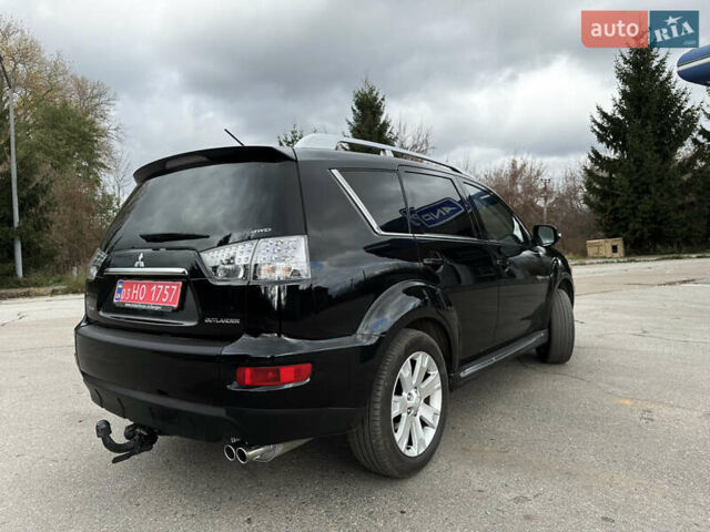 Чорний Міцубісі Аутлендер, об'ємом двигуна 2.2 л та пробігом 236 тис. км за 11399 $, фото 5 на Automoto.ua
