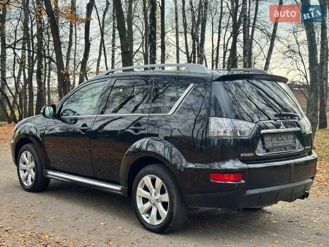 Чорний Міцубісі Аутлендер, об'ємом двигуна 2.2 л та пробігом 155 тис. км за 11599 $, фото 21 на Automoto.ua