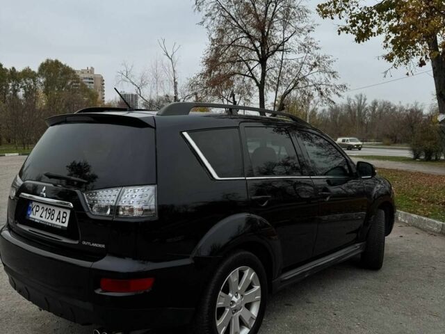 Черный Мицубиси Аутлендер, объемом двигателя 2.2 л и пробегом 253 тыс. км за 12500 $, фото 4 на Automoto.ua