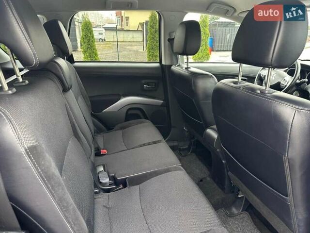 Черный Мицубиси Аутлендер, объемом двигателя 2.2 л и пробегом 226 тыс. км за 10750 $, фото 36 на Automoto.ua