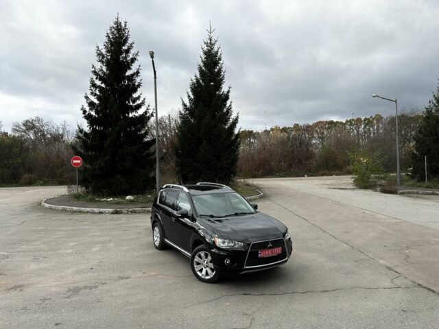 Черный Мицубиси Аутлендер, объемом двигателя 2.2 л и пробегом 237 тыс. км за 11450 $, фото 6 на Automoto.ua