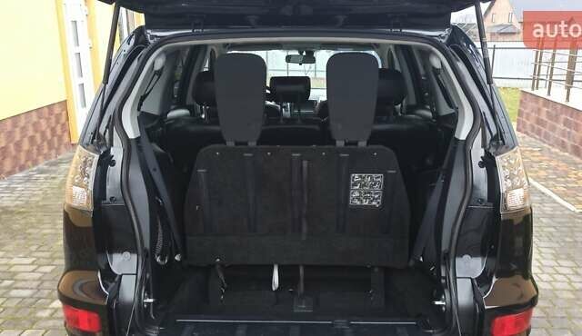 Черный Мицубиси Аутлендер, объемом двигателя 2.2 л и пробегом 209 тыс. км за 12700 $, фото 37 на Automoto.ua