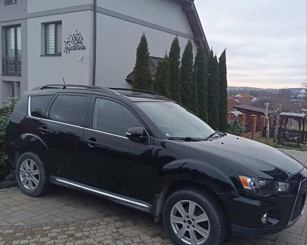 Черный Мицубиси Аутлендер, объемом двигателя 2 л и пробегом 196 тыс. км за 9900 $, фото 5 на Automoto.ua