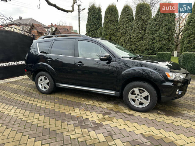 Чорний Міцубісі Аутлендер, об'ємом двигуна 2.2 л та пробігом 216 тис. км за 12000 $, фото 1 на Automoto.ua